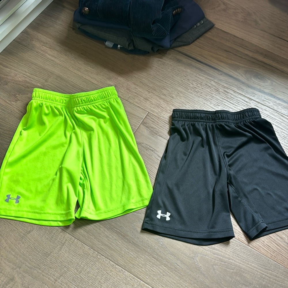Two pairs of under armor shorts size 7